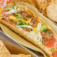 The Lowboy Beef Taco. · Seasoned ground beef, Tito’s cheeses, lettuce, and pico