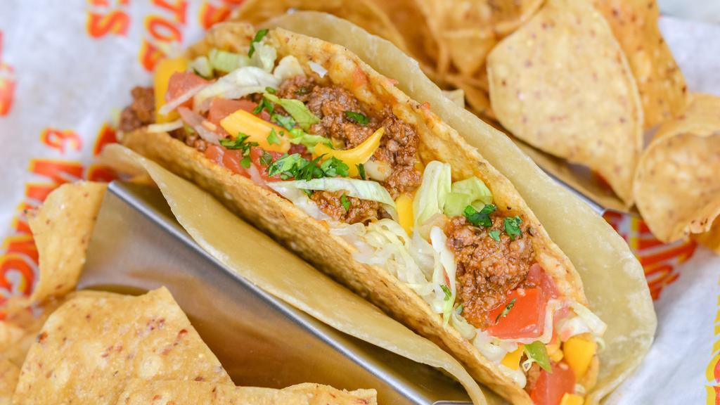 The Lowboy Beef Taco. · Seasoned ground beef, Tito’s cheeses, lettuce, and pico