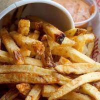 Hand-Cut Fries. · Idaho potato fries served with housemade spicy chipotle sauce