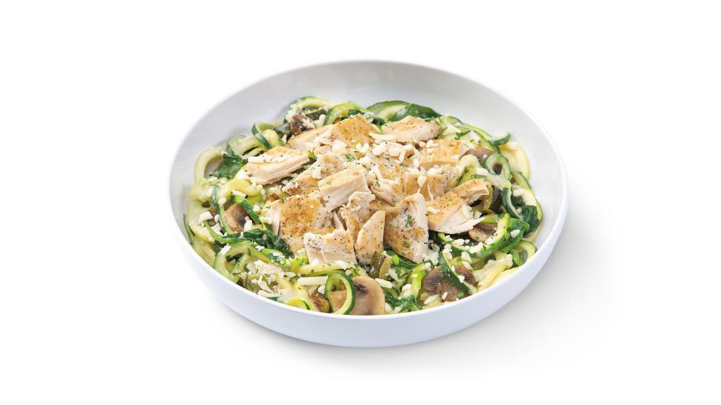 Zucchini Roasted Garlic Cream With Grilled Chicken · A creamy and paleo-friendly combination of zucchini noodles in roasted garlic cream sauce with grilled chicken, roasted zucchini, mushrooms and spinach, finished with MontAmoré cheese and parsley.