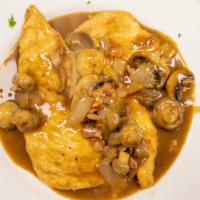 Chicken Marsala · Sautéed with fresh mushrooms and diced prosciutto in a brown marsala wine sauce.