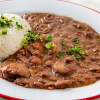 Ham Bone Red Beans & Rice · Creole cream style red beans with ham hocks and andouille sausage, steamed rice.