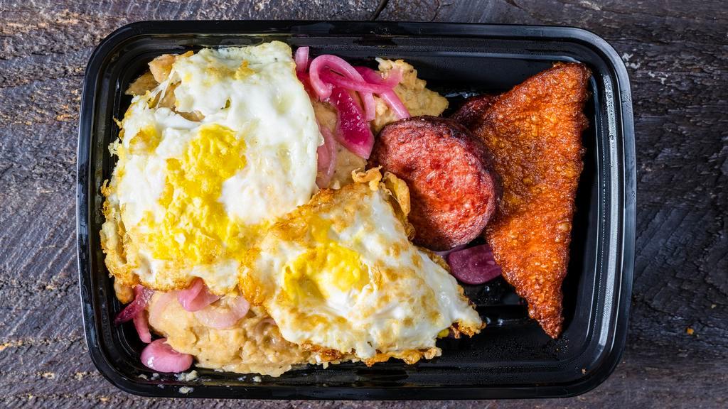 Dominican Mangú · Mangú with Dominican salami and fried cheese.