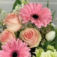 Just A Little Something · Our professional designer's will create a fresh selection of florals to help send a smile wh...