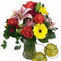 Marianne'S Medley · A colorful display of all the nature has to offer. Including Gerber daisies, roses, lilies, ...