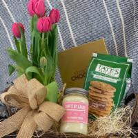 Spring Gift Basket · A basket full of fun! An assortment of cookies, a Surf's Up Candle, gourmet Chocolates and a...