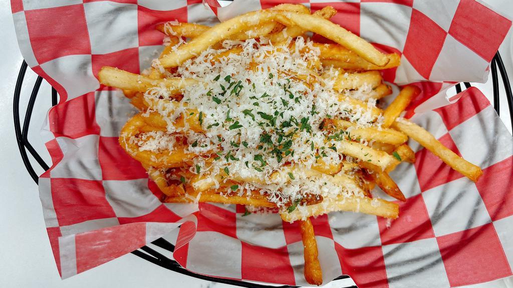  Truffle Fries  · Crispy French fries tossed with Truffle oil and freshly grated Parmesan cheese.