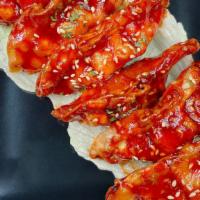 Chili Fried Dumplings (6 Pcs) - 칠리 만두  · Korean style fried dumplings (beef & vegetable) with Sweet & Spicy sauce. 6 pcs.