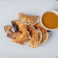 Homemade Pork & Vegetable Dumpling (5) · Balsamic vinegar sauce and shiitake mushroom.