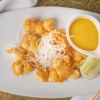 Curry Glazed Rock Shrimp · Spicy curry glaze & daikon