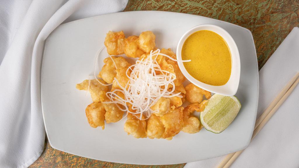 Curry Glazed Rock Shrimp · Spicy curry glaze & daikon