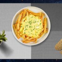 Miss Cheese Fries · Idaho potato fries cooked until golden brown and garnished with salt and melted cheddar chee...