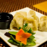 Happy Dumplings · Home made steamed or seared  with mixed vegetable dumplings.