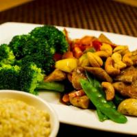 Soy Cashew Saute · Braised soy cutlets, broccoli, bell peppers, zucchini, asparagus and cashews in a kung pao s...