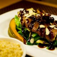 Beijing Seitan · Roasted whole wheat seitan and sauteed oyster mushrooms with chinese broccoli and japanese p...