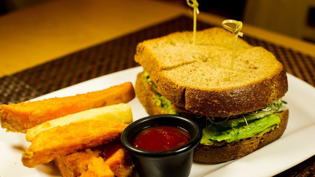 Go Zen Sandwich · Soy free option. Alfalfa sprouts, avocado, soy protein with a homemade sauce in a whole wheat bread, served with yam & yucca fries.