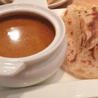 Roti Canai · Soy free option. Spicy Level 2. Serve with soy protien, carrot, potato on the side with one ...