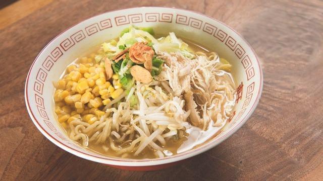 Miso Ramen · Soybean paste chicken broth served with wavy noodles, shredded chicken, bean sprouts, cabbage, crispy garlic, scallions, corn, and red pepper flakes.