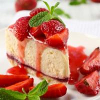 Strawberry Cheesecake · A rich and creamy New York-style cheesecake baked with strawberries inside a honey-graham cr...