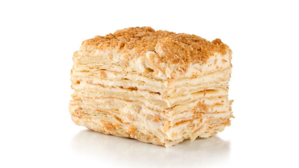 Napoleon Cake · Classic Russian cake made of very thin and flaky puff pastry cake layers and a smooth, rich and luscious pastry cream in between the layers.