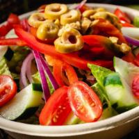 Napoles Green Salad · Tomatoes, cucumbers, red onion, olives, lettuce, red pepper and corn.