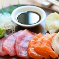 Sashimi · Seven pieces of assorted fish.