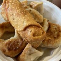 Chicken Dumplings · Eight pieces.