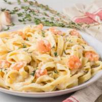 Fettuccine Alfredo · Fun and fresh fettuccine alfredo made with shrimp, chicken or no meat. Served with garlic br...