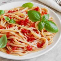 Tomato Basil Linguine Pasta · Fresh tomato based sauce mixed with linguine pasta served with parmesan cheese.