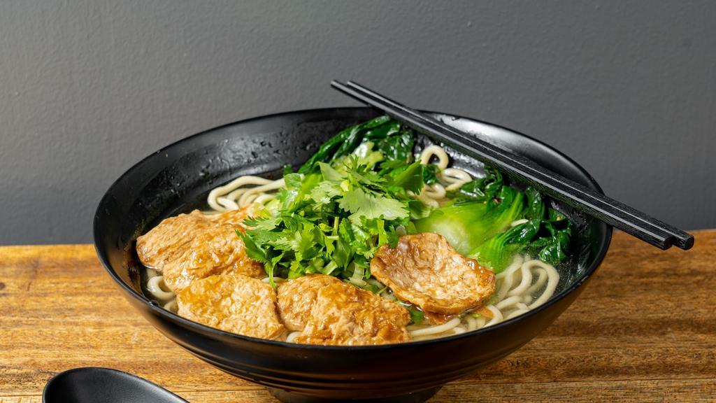 C-4 Vegetarian Noodle Soup (素汤面) · Savory light broth with noodles.