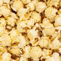 Fresh White Cheddar Popcorn · It's the party snack you can't stop eating. Better make a double order. Fresh and cheesy.