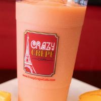 Mango Sunrise Smoothie · Passion mango juice, mango, peaches, pineapple, and raspberry sherbet.