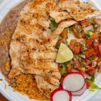 Pollo Asado Platter · Grilled chicken served with rice, beans, lettuce and pico de gallo.
LARGE SIZE ONLY