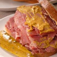 Corned Beef Sandwich · Served steamed or grilled with fried onions.