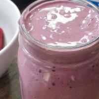Berry Protein Smoothie · Strawberries, Blueberries, Peanut Butter, Oats, Almond Milk & a scoop of Vanilla Protein.