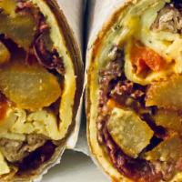 Classic Egg Wrap · Boar's Head ham, two eggs, cheese and home fries on a wrap.
