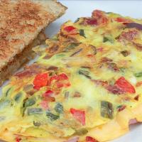 Western Omelette · Served w/ Scrambled Eggs, Ham, Bell Peppers & Onions. Served w/ Home Fries & Toast.