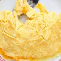 Cheese Omelette · Scrambled Eggs & A Choice Of Cheese. Served w/ Home Fries & Choice Of Toast.
