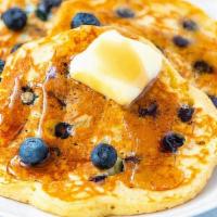 Blueberry Pancakes · 3 Buttermilk Pancakes with Blueberries. Served w/ Butter & Maple Syrup.