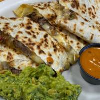 Steak Quesadilla · Steak with Grilled Peppers and Onions & Mexican Style 4 Cheese Blend. Side of Sour Cream & S...