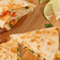 The Vegetarian Quesadilla · Grilled Peppers, Grilled Onions, Grilled Mushrooms, Broccoli, Corn with Mexican Style 4 Chee...