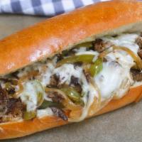 Philly Cheese Steak · Ground Thinly Sliced Beef Steak w/ Bell Peppers, Onions and your Choice of Melted Cheese.