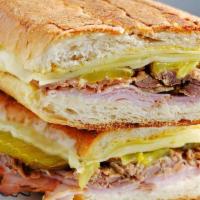 Cuban Combination Sandwich · Ham, roasted pork and swiss cheese with pickles and spicy mustard.