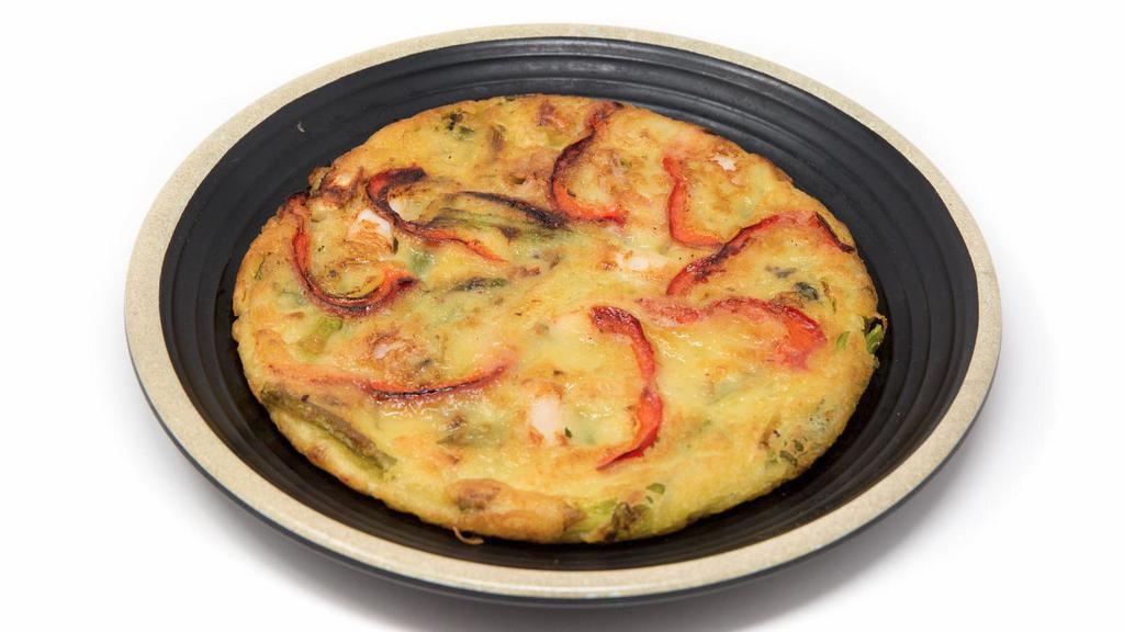 Haemool Pajun · Seafood and scallion pancake.
