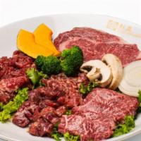 Premium Beef Combo (For 2 People) · Deung Sim(Prime Ribeye), Ju Mu Luk(Prime Marinated Boneless Short Rib), Bul Goki(Prime Marin...