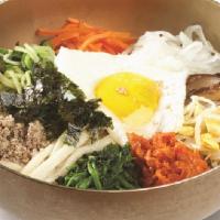 Bibim Bop · Rice topped with variety of cooked vegetables and ground beef.