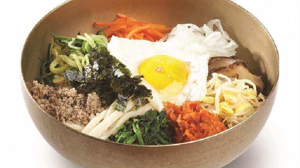 Bibim Bop · Rice topped with variety of cooked vegetables and ground beef.