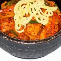 Jeyook Bibim Bop · Spicy pork and vegetables in hot pot.