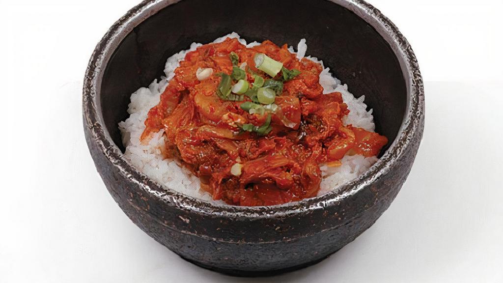 Kimchi Bibim Bop · Kimchi,pork,vegetables and egg in hot pot.