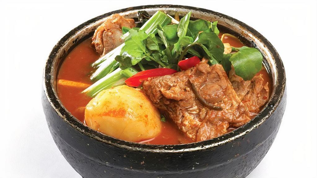 Gamja Tang · Spicy pork bone and potato stew.